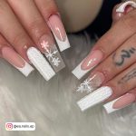 Hands Over A White Fur Showing White Long Nails That Are Perfect For Winter'S Look