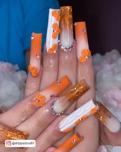 Long Square Tip Milky White And Orange Nails With Glitter, Ombre, Silver Gems, Floral Decoration And Cuticle Gems