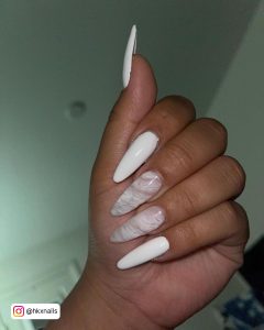 Long White Almond Nails With Two Marble Effect Nails