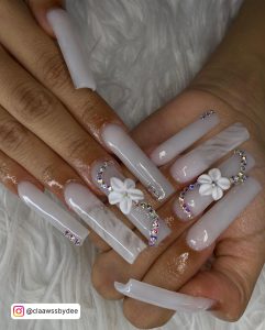 Long White And Silver Glitter Square Nails With Rhinestones And 3D White Flower