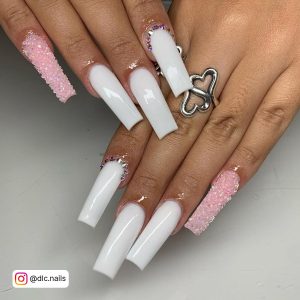 Long White Square Nails With One Light Pink Sparkle Nail
