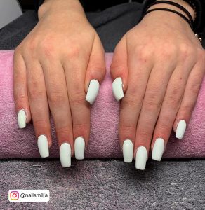 Milky White Coffin Nails On A Towel