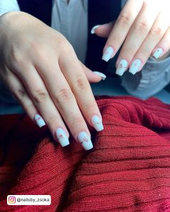Milky White Square Tip Nails With Pink Floral Design On Each Nail