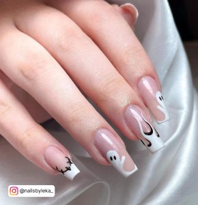 Minimalistic Coffin Black And White Acrylic Nails With Fiery Design, Ghost Art, And Halloween French Tips Over White Satin Clothe.