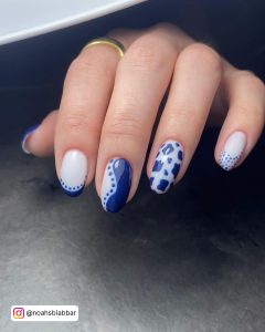 Mixed Art Dark Blue And White Nails Design With Polka Dot Tips, Cow Prints, And Ying-Yang Design