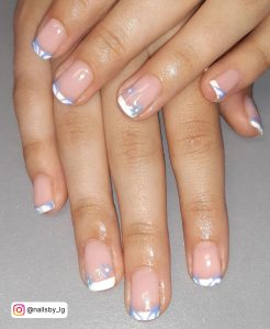 Natural Blue And White French Tip Nails With Flowery Design