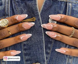 Nude And White Nails On A Denim Jacket