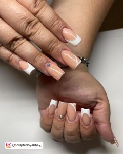 Nude And White Nails With Diamonds On One Finger