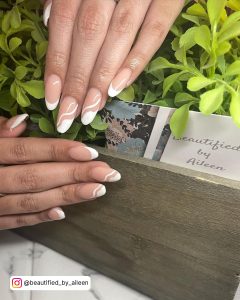 Nude And White Swirl Almond Nails With French Tips