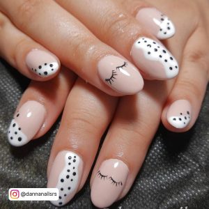 Nude Nails With White Division And Polka Dots