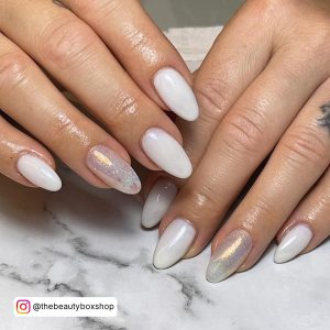 Oval Milky White Nails With A Opalescent Glitter Feature Nail