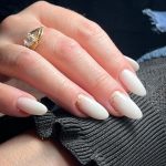 Oval Milky White Nails With Rose Gold Cuticle Glitter