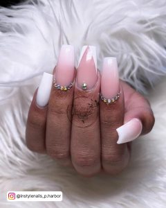 Pink And White Ombre Nails With Diamonds On 3 Fingers