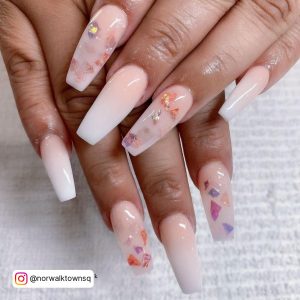 Pink And White Ombre Nails With Diamonds On Two Nails