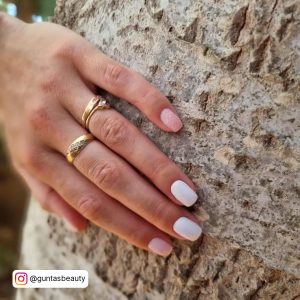 Pink And White Powder Nails On A Rock