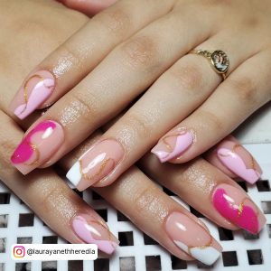 Pink And White Swirl Nails With Golden Glitter Lines