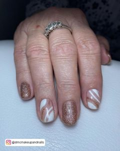 Pink Nails With White Stripes And Gold Glitter