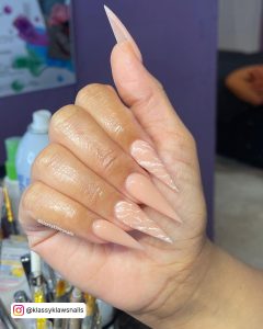 Pink White Marble Nails In Stilleto Shape