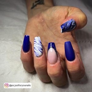 Pretty Mix And Match Royal Blue And White Nails With Marbling, Matte Nais, Glossy Blue, French Tips, And Tiger Print Design