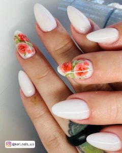 Rose-Flower White Almond Acrylic Nails On White Surface