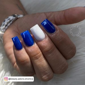 Royal Blue Square Nails With One White Feature Nail