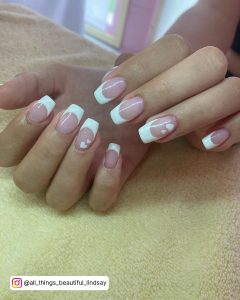 Shiny French Tip White Nails With Heart Design