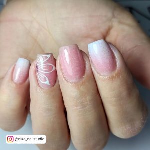 Short Glittery White Ombre Nail Design With Flower Design