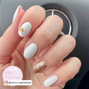 Short Round White And Gold Nails With Gold Gliter And Gold Rhinestones