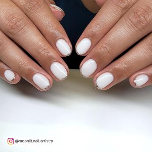 Short Round White Nails With Gold Tips