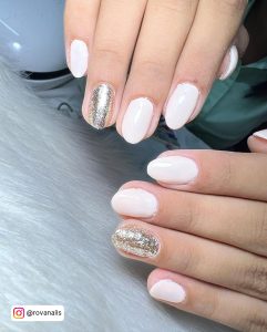 Short Shiny Milky White Gel Nail Polish With Gold Glitters In White Fur