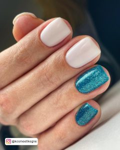 Short Square Tip Milky White Nails With Two Blue Glitter Nails