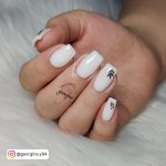 Simple White Gel Nails With Design On White Fur