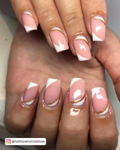Square Nude Nails With White Accent And Gold Glitter Stripes