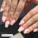 Square Tip Milky White Nails With Small Red Hearts For Valentines Day