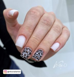 Square Tip Milky White Nails With Two Leopard Print Feature Nails