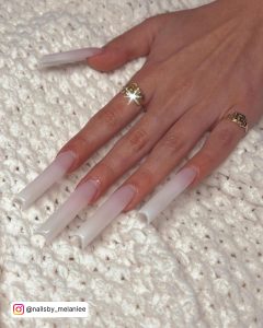 Super-Long Pink And White Ombre Nails Over Wool Clothe