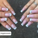 Two Girls Displaying Their Simple White French Tip Coffin Nails