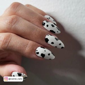 White Almond Nails With Black Cow Print Design