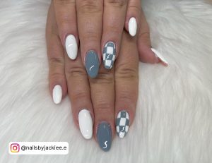 White Almond Nails With One Grey Nail And One White And Grey Checkered Nail