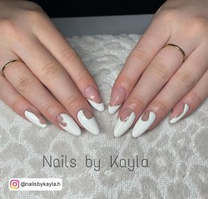 White And Nude Almond Nails With French Tip And Negative Space Design