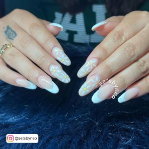 White French Tip Almond Nails With Simple White Daisy Design On Two Nails