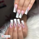 White French Tip Nails With Diamonds On Fur