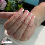 White French Tip Nails With Glittery Pink Color