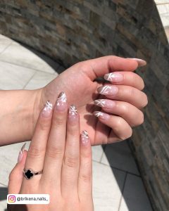 White Heart On Nails And Golden Swirls