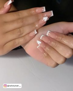 White Heart On Nails Simple And Elegant