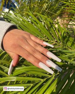 White Long Nails With Diamonds On Leaves