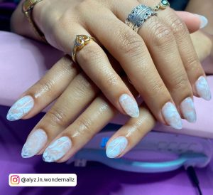 White Marble Acrylic Nails With Cute Rings