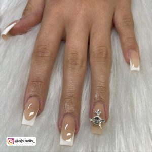 White Nails French Tip With Unique Design On One Finger