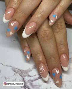 White Nails With Blue Heart For A Cute Look