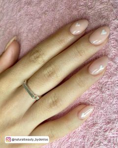 White Nails With Heart Design For A Minimalistic Look